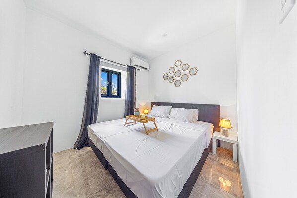 Experience the ultimate night's rest on a comfortable king-size bed.