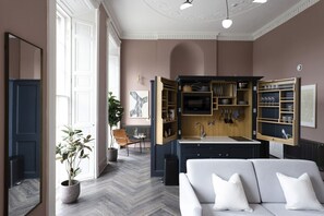 Studio with bed and kitchen