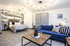 Studio with bed and kitchen