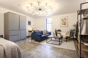 Studio with bed and kitchen