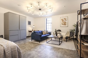 Studio with bed and kitchen