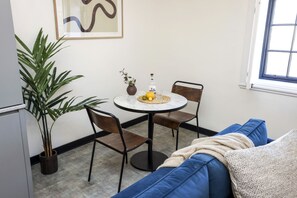 Studio with bed and kitchen