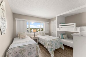 Plenty of room for the kiddos! With two (2) single beds and a built-in bunk set, it's like having a sleep over.