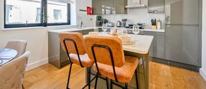 SPACIOUS KITCHEN AND BAR AREA