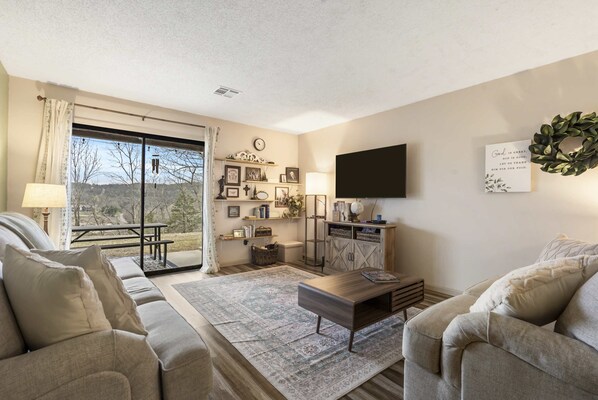 Curl up in the serene living room & stream your favorites on the smart TV