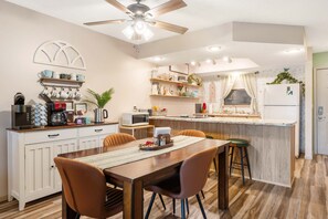Make mealtime memories together at the dining table, seating 4