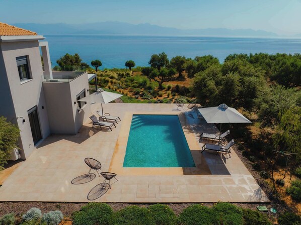 Just steps from the villa, the pool is the heart of the outdoor area