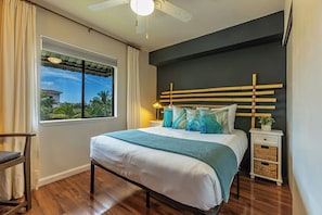 Guest bedroom features a queen bed