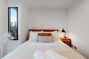 The bedroom is calm and peaceful with neutral colours.