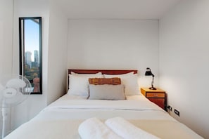 The bedroom is calm and peaceful with neutral colours.