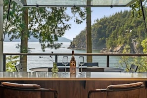 View from kitchen with pass-through to deck