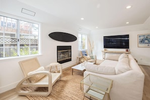 Living Room with Fireplace & Television