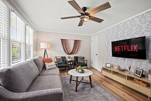 Bond with your loved ones in this charming and well-decorated family room