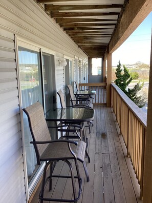 Captain tables on the patio to enjoy the views of Dewey and the bay
