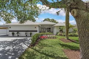 Your first views of the home look like this with large driveway and plenty of parking