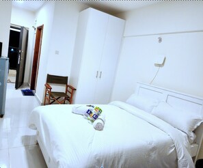 Double bed with comfy thick mattress and crisp white linnen