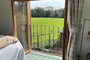Stunning countryside views from the bedroom.