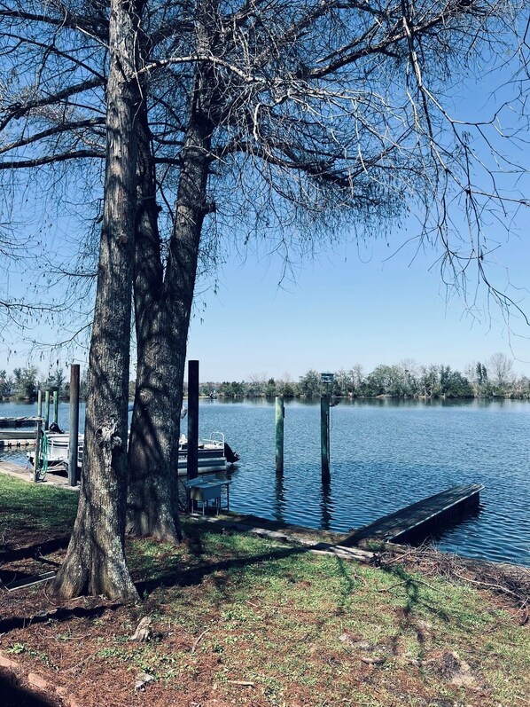 Backyard view with property sitting on the lake!
