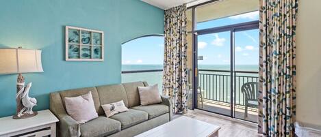 Stepping into this penthouse condo is like walking into a dream. This condo features the best views in North myrtle beach of both the sunrise and sunsets. The living room features a full couch with queen-sized sofa sleeper and Smart TV.
