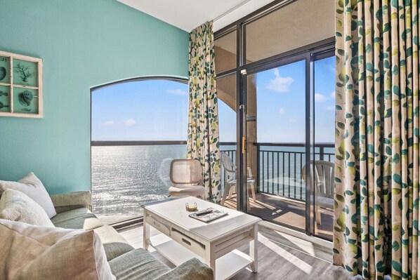 Stepping into this penthouse condo is like walking into a dream.  This condo features the best views in North myrtle beach of both the sunrise and sunsets.  The living room features a full couch with queen-sized sofa sleeper and Smart TV.