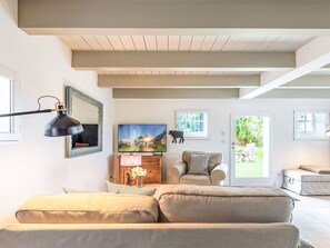 Furniture, Interior Design, Couch, Flooring, Wall, Floor, Ceiling, Wood, Living Room, Room