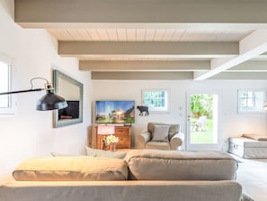 Furniture, Interior Design, Couch, Flooring, Wall, Floor, Ceiling, Wood, Living Room, Room