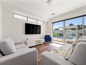 Relax in comfort and style in our cozy living room, designed for ultimate relaxation. 