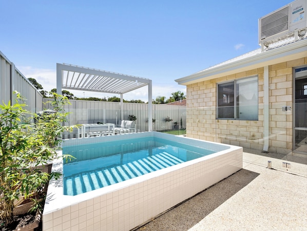 Take a refreshing dip in your private oasis! Our pool is the perfect spot to unwind and enjoy the sunny Mandurah weather.