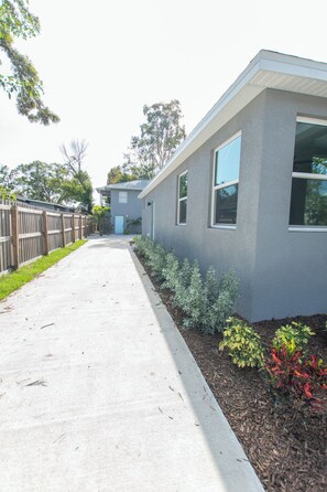 Apartment is located in rear building, downstairs. 