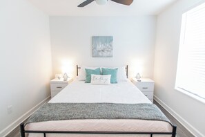 Queen sized bed with memory foam mattress.