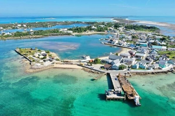 We are located by the water with the brown roof
