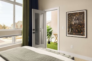 Primary bedroom with private balcony