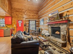 Spacious Living Room with Gas Fireplace, Sleeper Sofa and SMART TV with Cable & WIFI throughout vacation rental