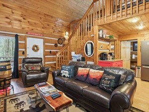 Spacious Living Room with Gas Fireplace, Sleeper Sofa and SMART TV with Cable & WIFI throughout vacation rental