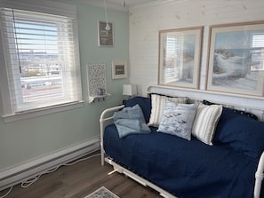 Trundle bed serves as a couch and daybed during the day.