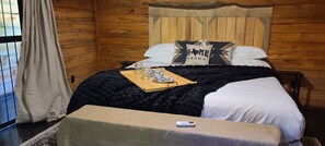 Rustic Trails - the Jail cabin's bedroom seen from the Living Room 