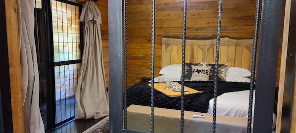 Rustic Trails - the Jail cabin's bedroom seen from the Living Room
