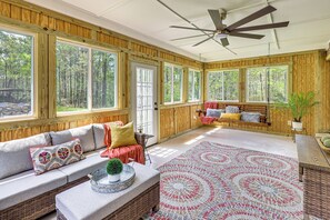 Sunroom | Peaceful Wooded Property