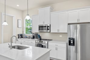 Well-lit kitchen.