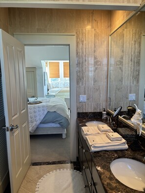 Enjoy Stone Countertops & Lacoste Towels