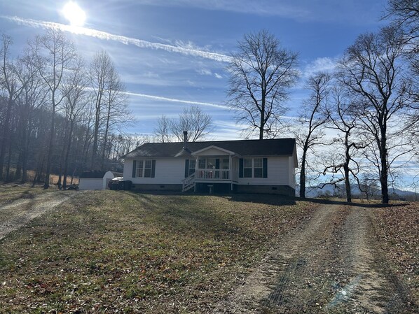 Front of house with circular driveway