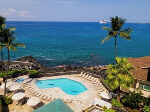 Relax in this community pool right by the water.