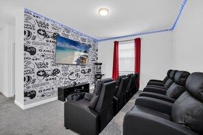 Enjoy blockbusters in plush comfort with top-tier sound & screen