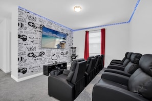 Enjoy blockbusters in plush comfort with top-tier sound & screen