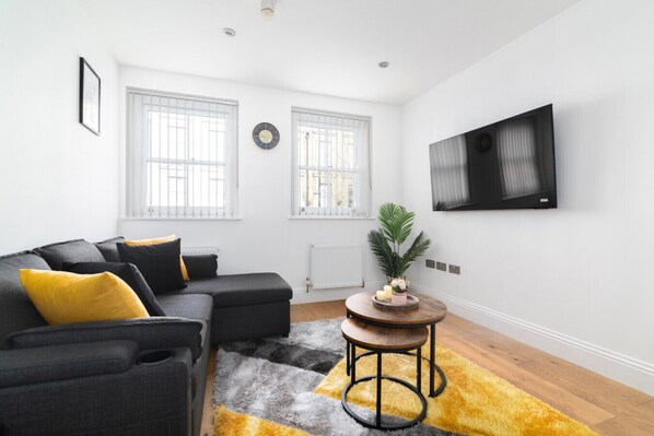 Cozy Living Room with Sofa bed and Chill in style with high-speed internet & Smart TV for your ultimate relaxation