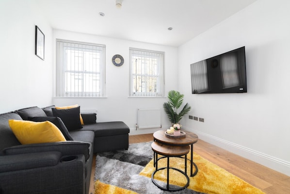 Cozy Living Room with Sofa bed and Chill in style with high-speed internet & Smart TV for your ultimate relaxation