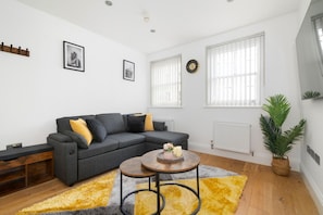 Cozy Living Room with Sofa bed and Chill in style with high-speed internet & Smart TV for your ultimate relaxation