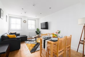 Cozy Living Room with Sofa bed and Chill in style with high-speed internet & Smart TV for your ultimate relaxation