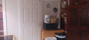Kitchen storage and main floor bathroom access