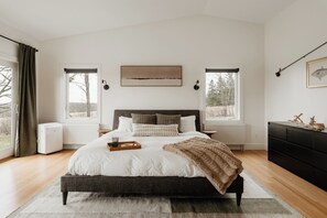 Expansive King bedroom with en suite bathroom and private deck.